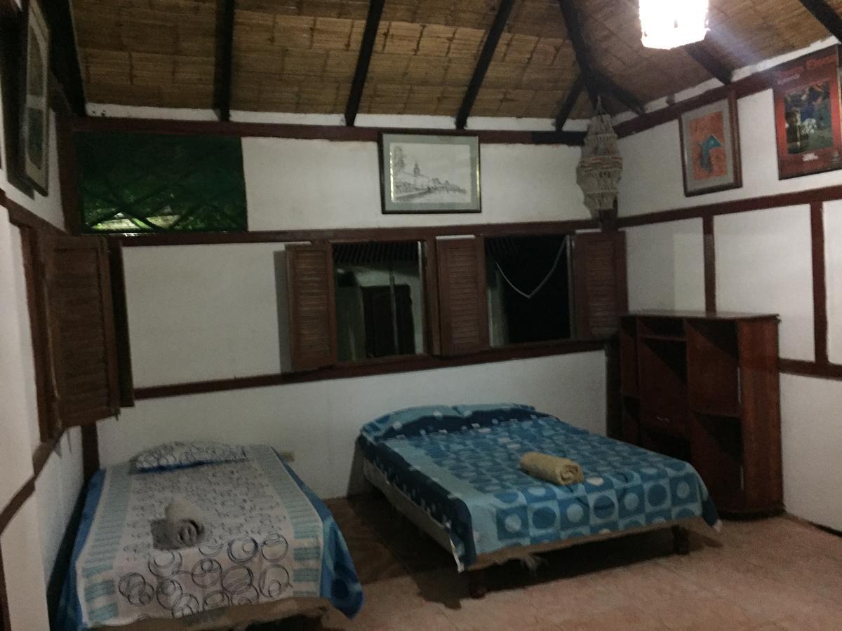 Angauel Inn Cerro Playa Rosada Пальмар Экстерьер фото